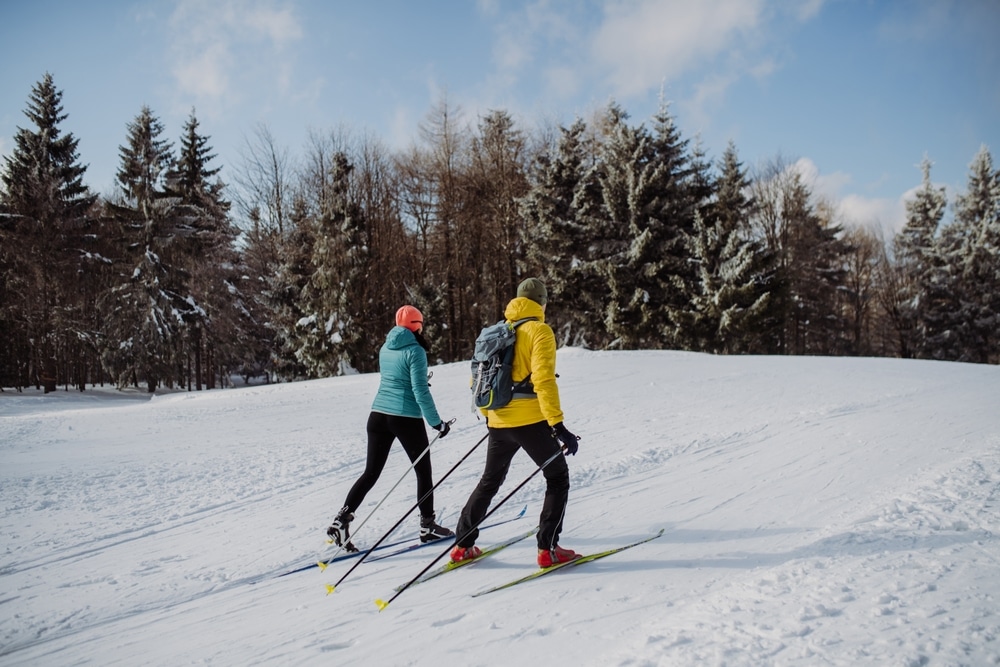 A couple enjoying winter in Colorado on cross-country skis